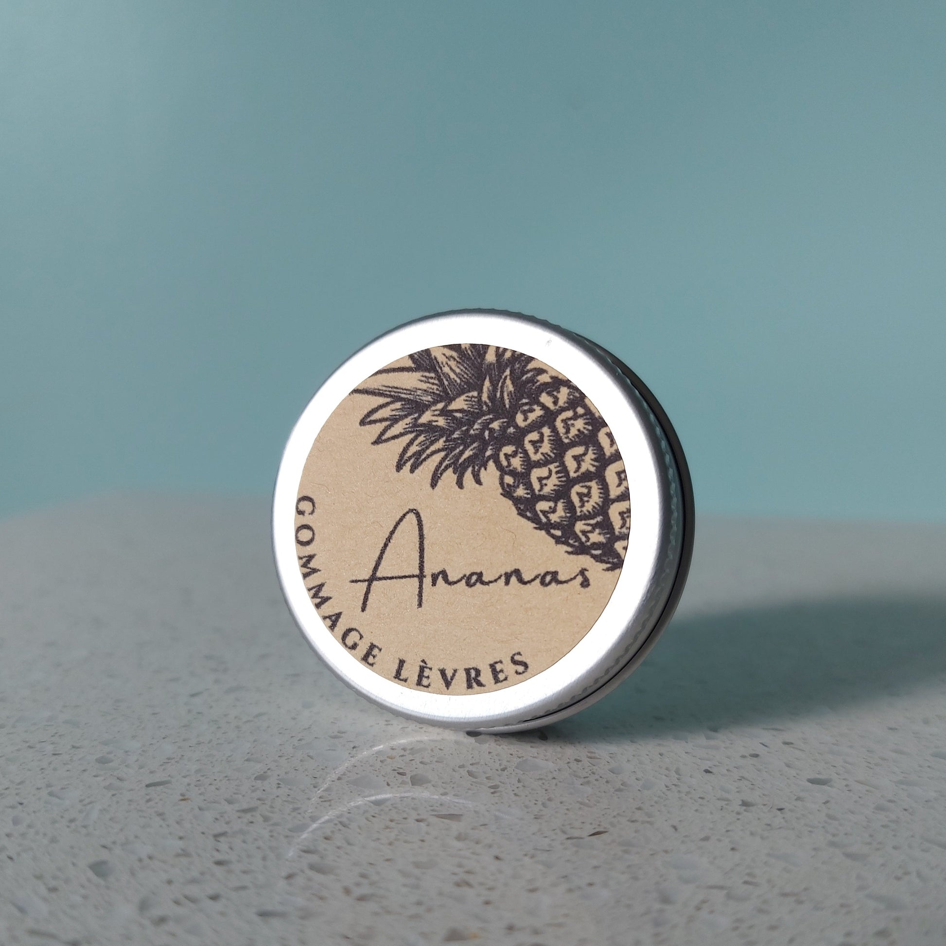 OragnicPineapple lip scrub in aluminium tin with kraft paper label